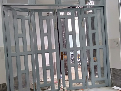 Sửa cửa sắt Củ Chi giá rẽ tận nơi tại nhà uy tín